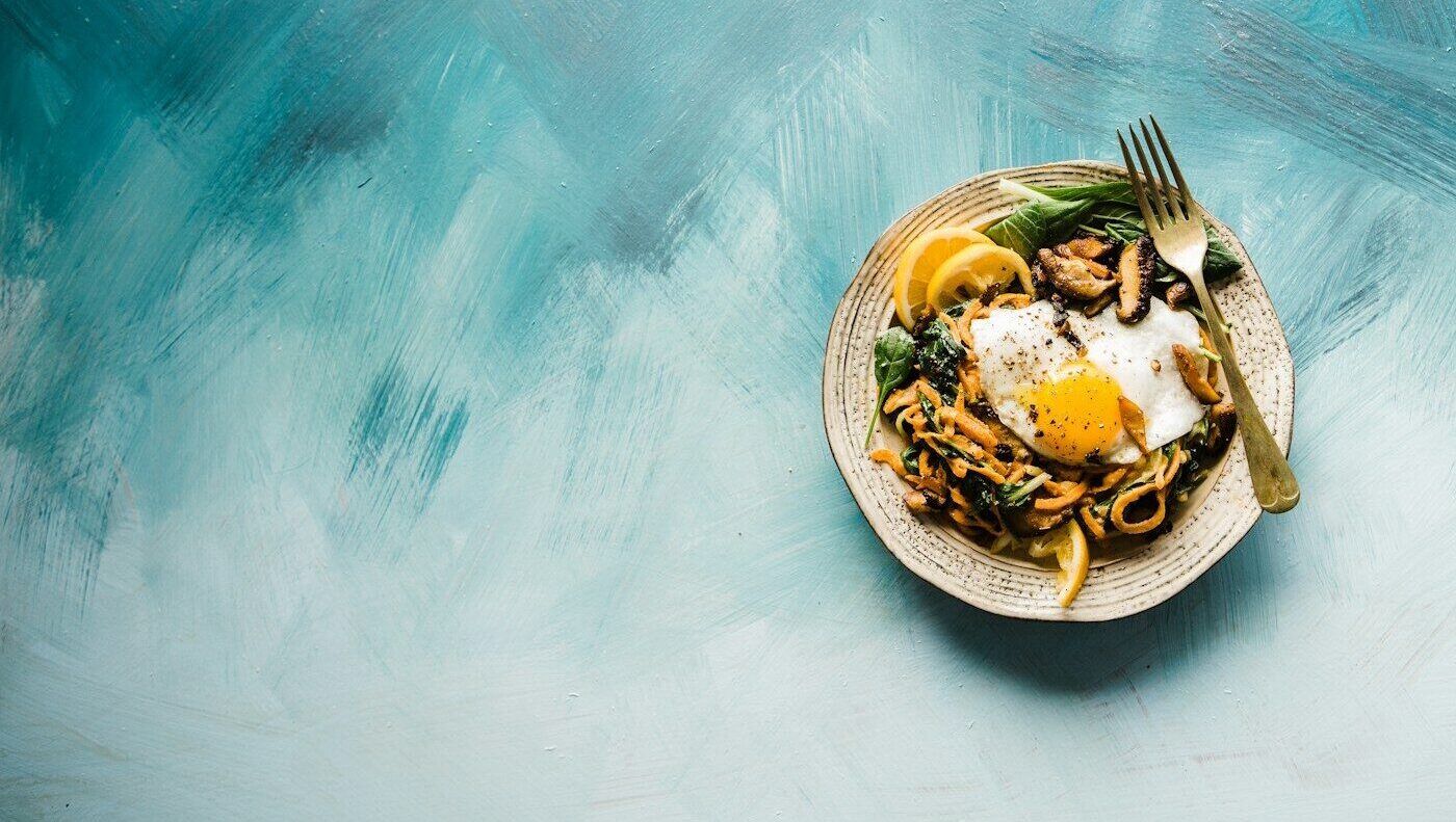 pasta dish on brown plate